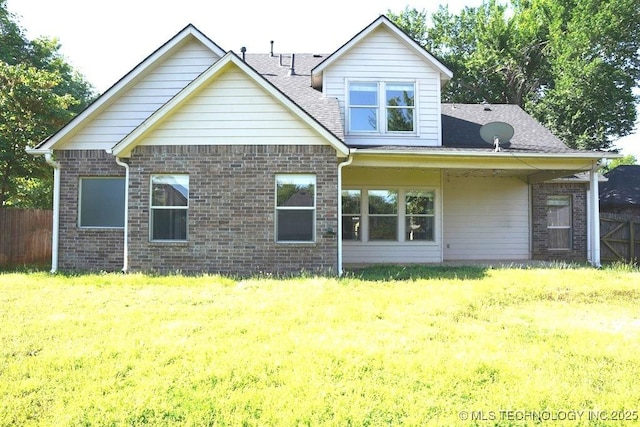717 W 39th St, Sand Springs, OK 74063 - back of property with brick siding and a shingled roof