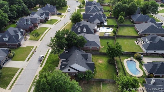 717 W 39th St, Sand Springs, OK 74063 - aerial overview of property's location with nearby suburban area and a pool area