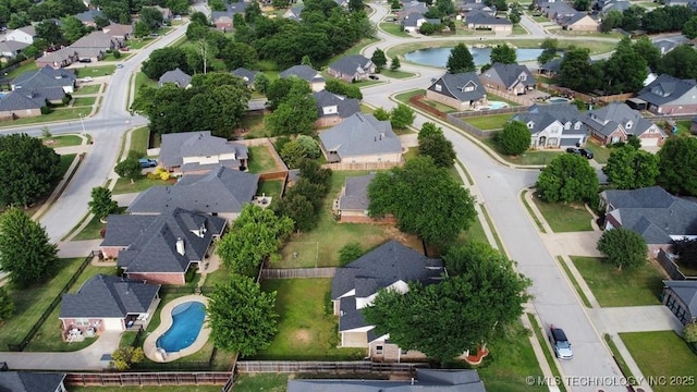 717 W 39th St, Sand Springs, OK 74063 - aerial overview of property's location featuring nearby suburban area, a pool area, and a large body of water