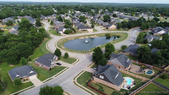 717 W 39th St, Sand Springs, OK 74063 - aerial view of property and surrounding area with nearby suburban area and a nearby body of water