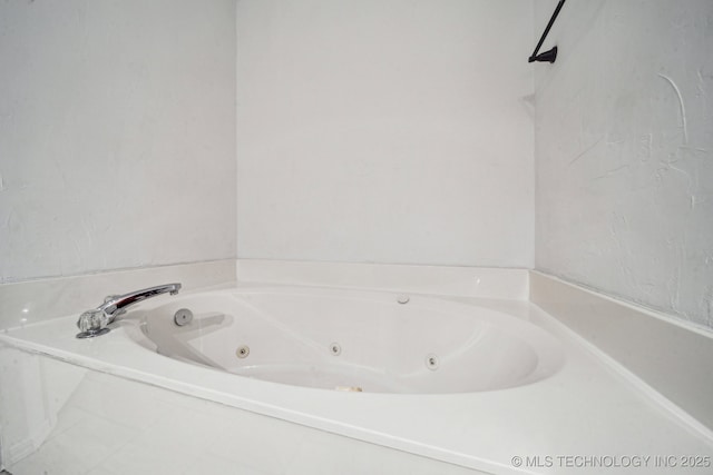 bathroom with a jetted tub
