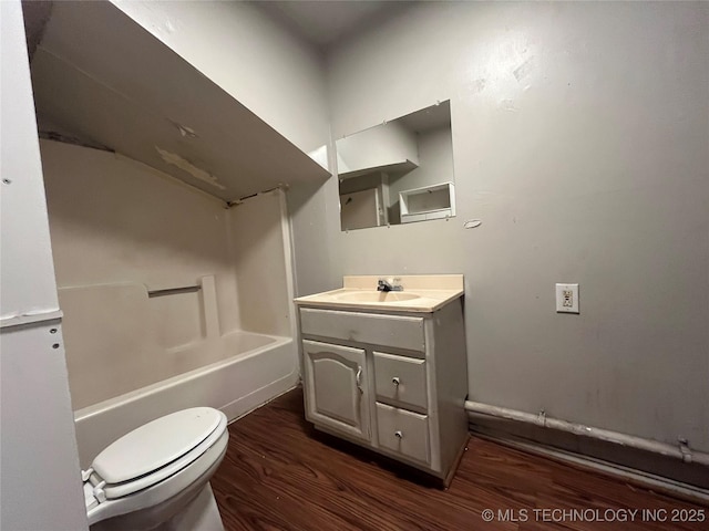 628 S 105th E Pl, Tulsa, OK 74128 - bathroom with wood finished floors, vanity, toilet, and washtub / shower combination