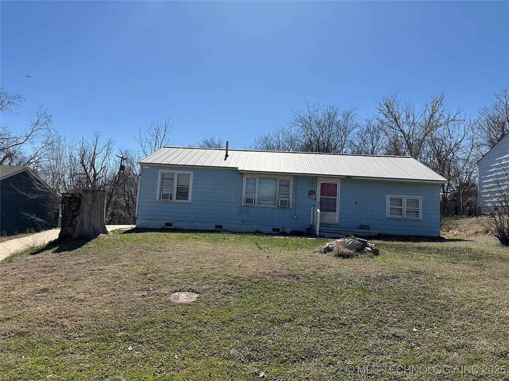 6934 E Marshall St, Tulsa, OK 74115 - single story home featuring metal roof, crawl space, and a front yard