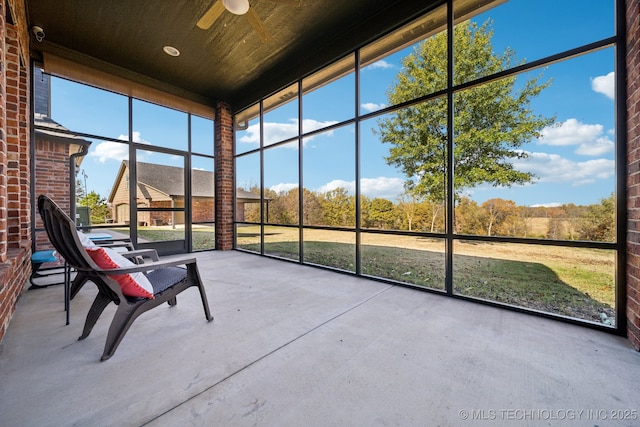 2001 E 158th St, Skiatook, OK 74070 - sunroom featuring a ceiling fan