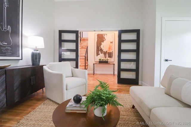 2503 S Birmingham Ave, Tulsa, OK 74114 - living room with wood finished floors and baseboards