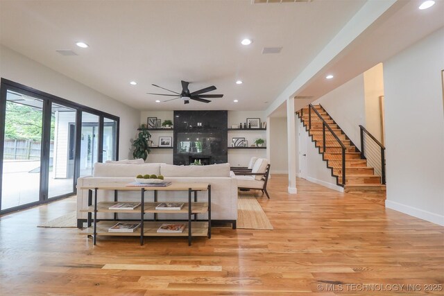 2503 S Birmingham Ave, Tulsa, OK 74114 - living room featuring recessed lighting, stairway, a ceiling fan, light wood-style flooring, and baseboards