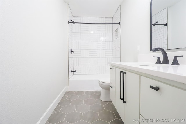 2503 S Birmingham Ave, Tulsa, OK 74114 - full bath featuring vanity, toilet, shower / bath combination, tile patterned flooring, and baseboards