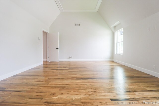 2503 S Birmingham Ave, Tulsa, OK 74114 - additional living space featuring high vaulted ceiling, light wood-style floors, and baseboards