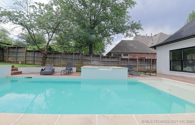 2503 S Birmingham Ave, Tulsa, OK 74114 - view of swimming pool with a fenced backyard