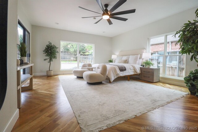 2503 S Birmingham Ave, Tulsa, OK 74114 - bedroom featuring baseboards and ceiling fan