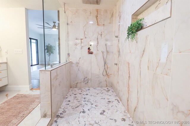 2503 S Birmingham Ave, Tulsa, OK 74114 - full bathroom with ceiling fan, a marble finish shower, and vanity
