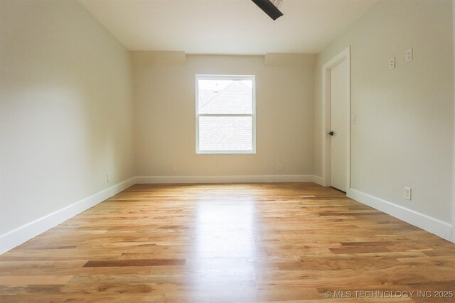 2503 S Birmingham Ave, Tulsa, OK 74114 - unfurnished room featuring light wood-type flooring and baseboards
