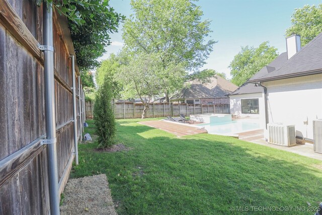 2503 S Birmingham Ave, Tulsa, OK 74114 - view of yard with central AC unit