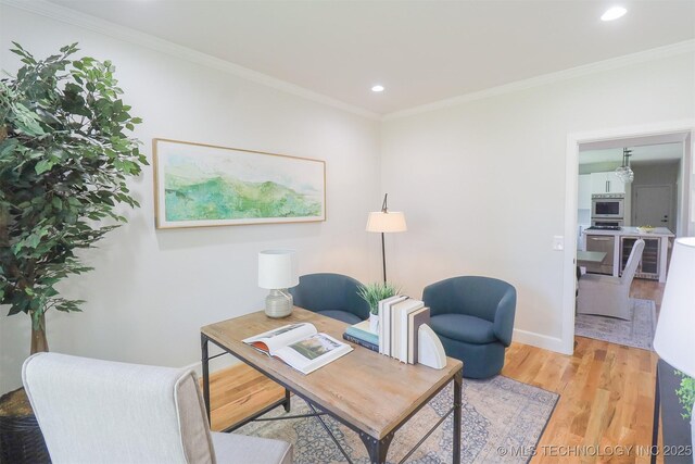 2503 S Birmingham Ave, Tulsa, OK 74114 - living area featuring wood finished floors, a desk, recessed lighting, ornamental molding, and baseboards