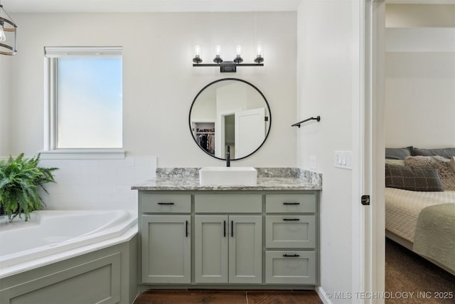 9429 Bryan Rd, Shawnee, OK 74855 - ensuite bathroom featuring vanity and a bath