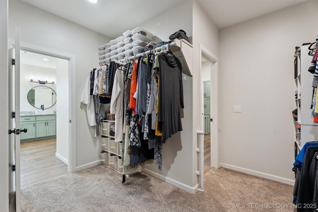 9429 Bryan Rd, Shawnee, OK 74855 - walk in closet with carpet floors