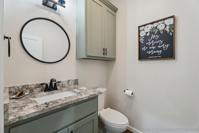 9429 Bryan Rd, Shawnee, OK 74855 - half bathroom featuring vanity and toilet