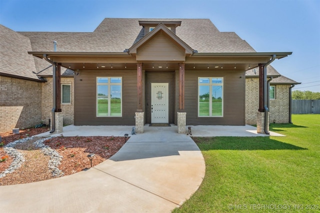 9429 Bryan Rd, Shawnee, OK 74855 - craftsman inspired home with a shingled roof and brick siding