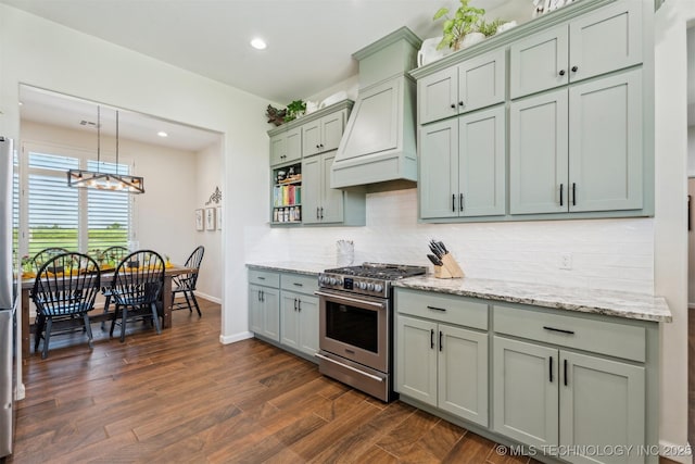 9429 Bryan Rd, Shawnee, OK 74855 - kitchen with gas range, premium range hood, decorative backsplash, dark wood-type flooring, and light stone countertops