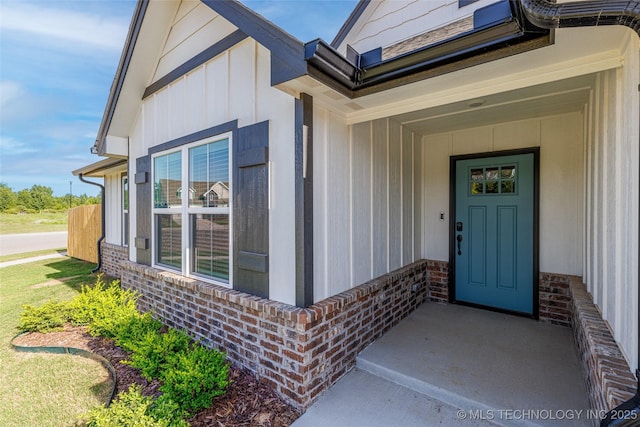 15922 E 75th Pl N, Owasso, OK 74055 - property entrance with brick siding and board and batten siding