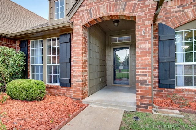 1901 N 8th St, Broken Arrow, OK 74012 - doorway to property with brick siding and roof with shingles