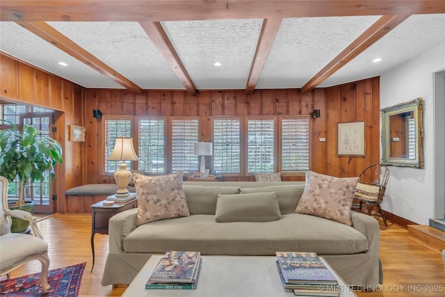 2815 S Woodward Blvd, Tulsa, OK 74114 - living area with beamed ceiling, wooden walls, light wood finished floors, and recessed lighting