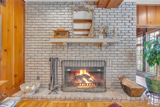 2815 S Woodward Blvd, Tulsa, OK 74114 - detailed view of a brick fireplace and wood finished floors