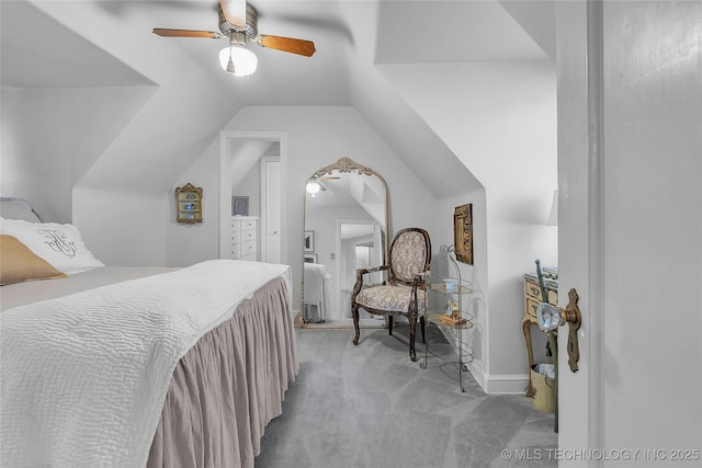 2815 S Woodward Blvd, Tulsa, OK 74114 - bedroom featuring light carpet, vaulted ceiling, and a ceiling fan