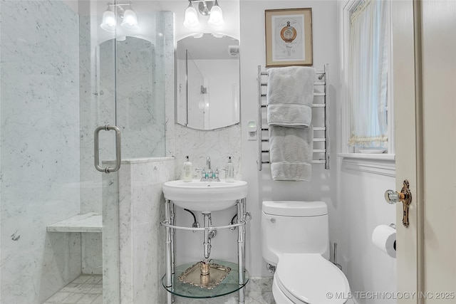 2815 S Woodward Blvd, Tulsa, OK 74114 - full bath with a marble finish shower, toilet, radiator, tile walls, and a sink