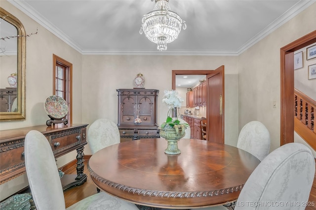 2815 S Woodward Blvd, Tulsa, OK 74114 - dining area with a chandelier, wood finished floors, and crown molding