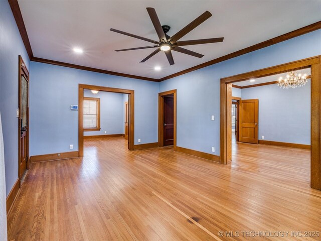 1618 S Rockford Ave, Tulsa, OK 74120 - spare room featuring ornamental molding, a ceiling fan, a chandelier, light wood finished floors, and recessed lighting