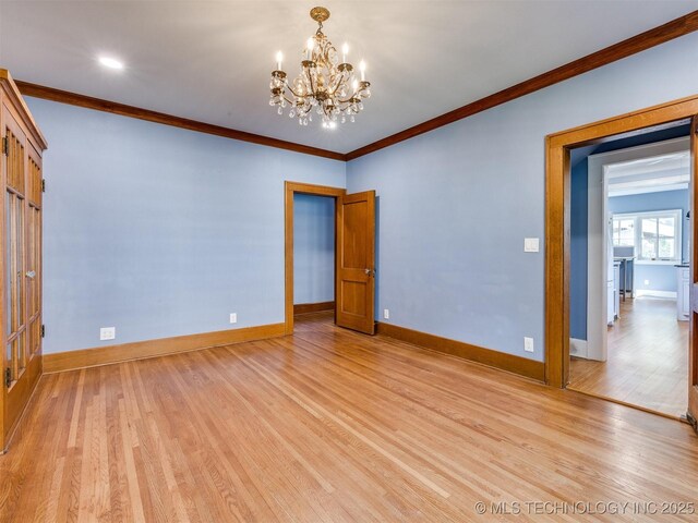 1618 S Rockford Ave, Tulsa, OK 74120 - spare room with light wood-type flooring, a chandelier, baseboards, and crown molding