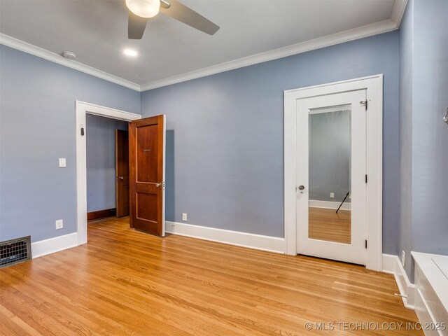 1618 S Rockford Ave, Tulsa, OK 74120 - spare room with ornamental molding, a ceiling fan, light wood-style floors, baseboards, and a smoke detector