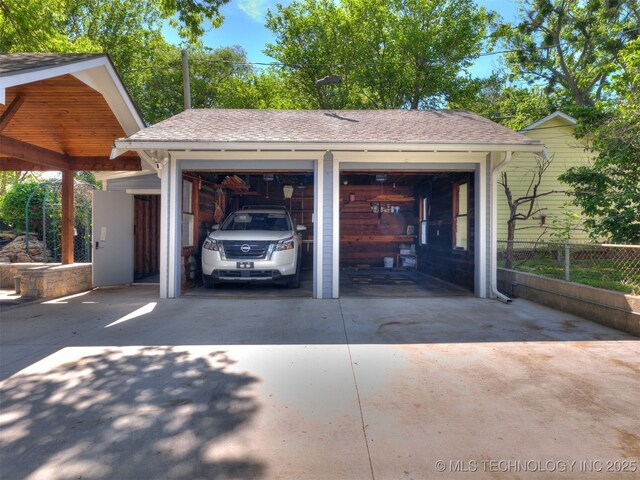1618 S Rockford Ave, Tulsa, OK 74120 - detached garage featuring fence