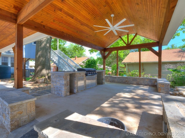 1618 S Rockford Ave, Tulsa, OK 74120 - view of patio / terrace featuring an outdoor kitchen, a ceiling fan, a grill, stairs, and a gazebo