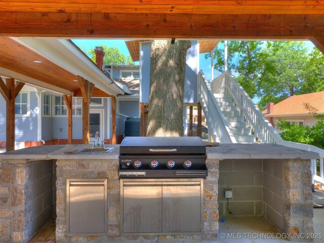 1618 S Rockford Ave, Tulsa, OK 74120 - view of patio / terrace with a sink, area for grilling, stairs, and a grill