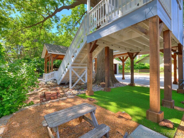 1618 S Rockford Ave, Tulsa, OK 74120 - view of grassy yard featuring stairs