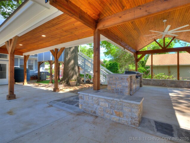 1618 S Rockford Ave, Tulsa, OK 74120 - view of patio with ceiling fan, stairway, exterior kitchen, a grill, and a gazebo