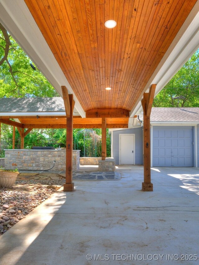 1618 S Rockford Ave, Tulsa, OK 74120 - view of patio / terrace with driveway