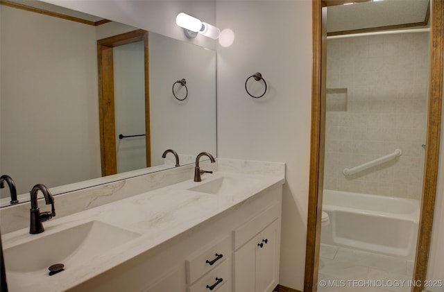 8242 S Sandusky Ave, Tulsa, OK 74137 - bathroom with double vanity, ornamental molding, toilet, and bathing tub / shower combination