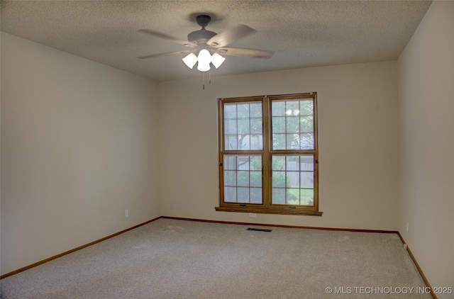 8242 S Sandusky Ave, Tulsa, OK 74137 - unfurnished room featuring ceiling fan, carpet, a textured ceiling, and baseboards