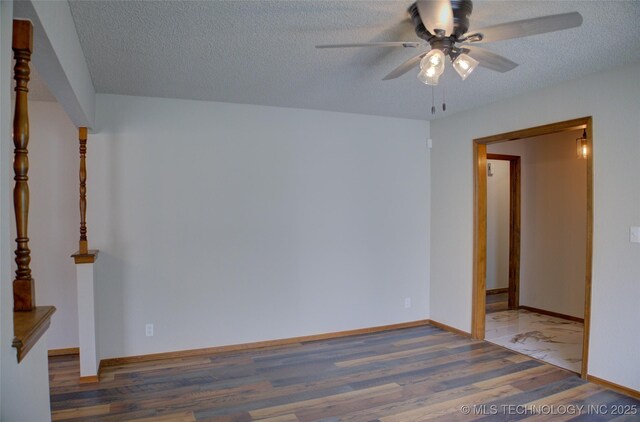 8242 S Sandusky Ave, Tulsa, OK 74137 - empty room featuring a ceiling fan, wood finished floors, a textured ceiling, and baseboards