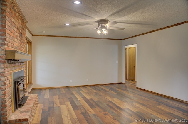 8242 S Sandusky Ave, Tulsa, OK 74137 - unfurnished living room featuring a ceiling fan, wood finished floors, baseboards, ornamental molding, and a textured ceiling
