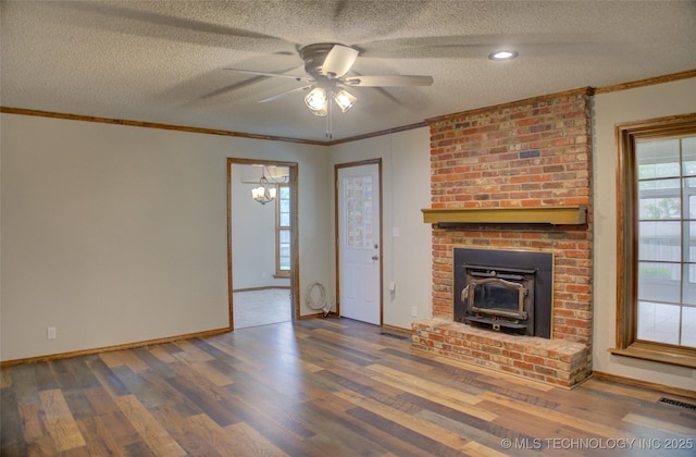 8242 S Sandusky Ave, Tulsa, OK 74137 - unfurnished living room featuring wood finished floors, baseboards, ceiling fan, crown molding, and a textured ceiling