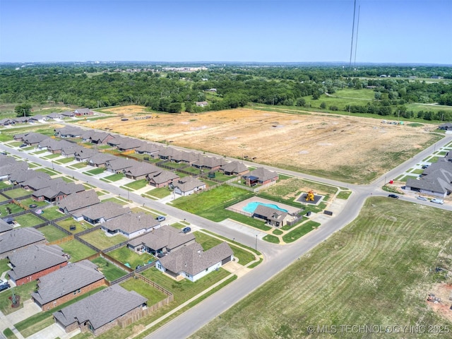 aerial view of property's location featuring nearby suburban area