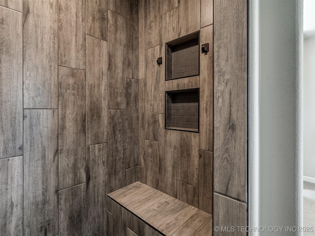 bathroom view of tiled shower