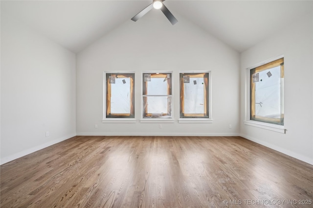 2607 E 135th Dr S, Bixby, OK 74008 - unfurnished room featuring ceiling fan, wood finished floors, vaulted ceiling, and baseboards