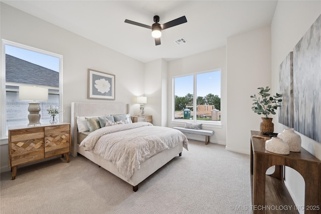 2607 E 135th Dr S, Bixby, OK 74008 - bedroom with light colored carpet and a ceiling fan