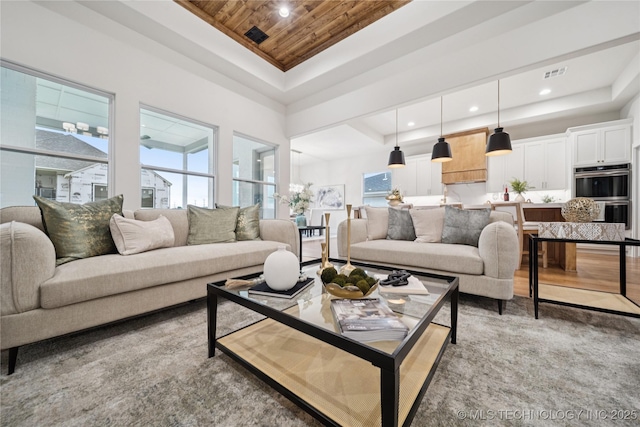 2607 E 135th Dr S, Bixby, OK 74008 - living area featuring a raised ceiling, wooden ceiling, and recessed lighting