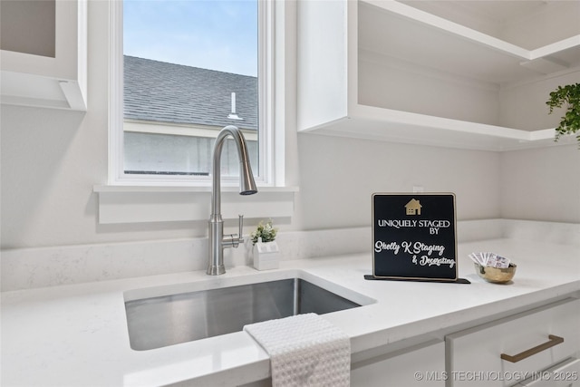 2607 E 135th Dr S, Bixby, OK 74008 - kitchen view of light countertops and white cabinetry